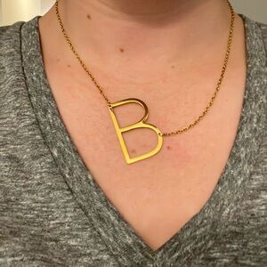 Gold B necklace. From Nordstroms. Large. Never been worn.